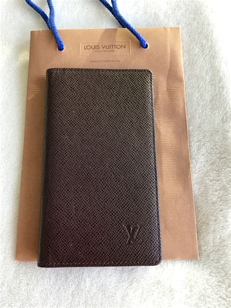 louis vuitton taiga wallet replica|louis vuitton false product id.